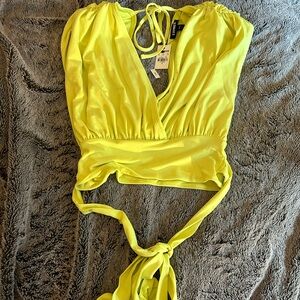 Express blouse super unique and cute greenish/yellow. small 
Brand new w tag